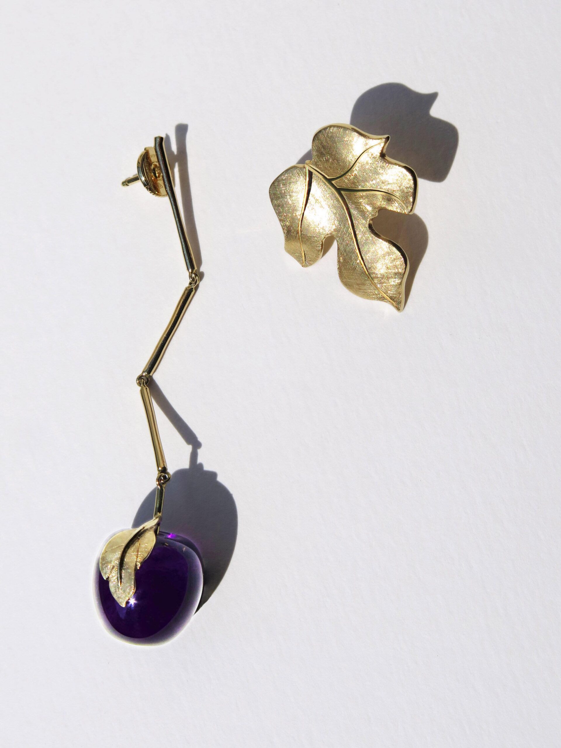 The Adam & Eve earrings by Francis de Lara