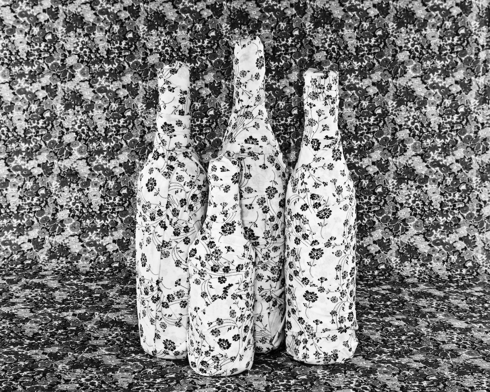 "Bottles on the Ground" by Corinne de San Jose (2012, Archival Inkjet Print)