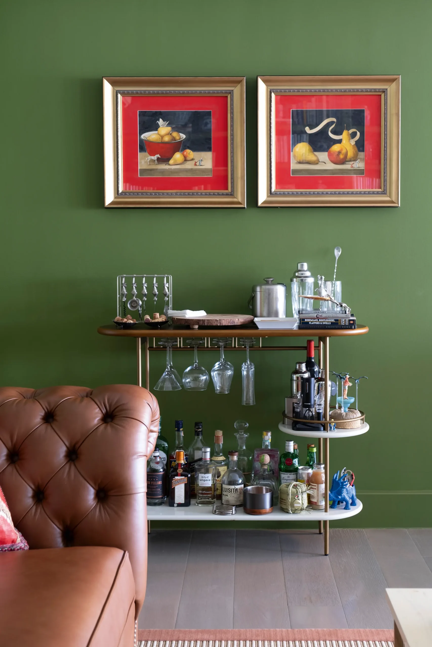 Bar cart under watercolors by Brian Uhing.