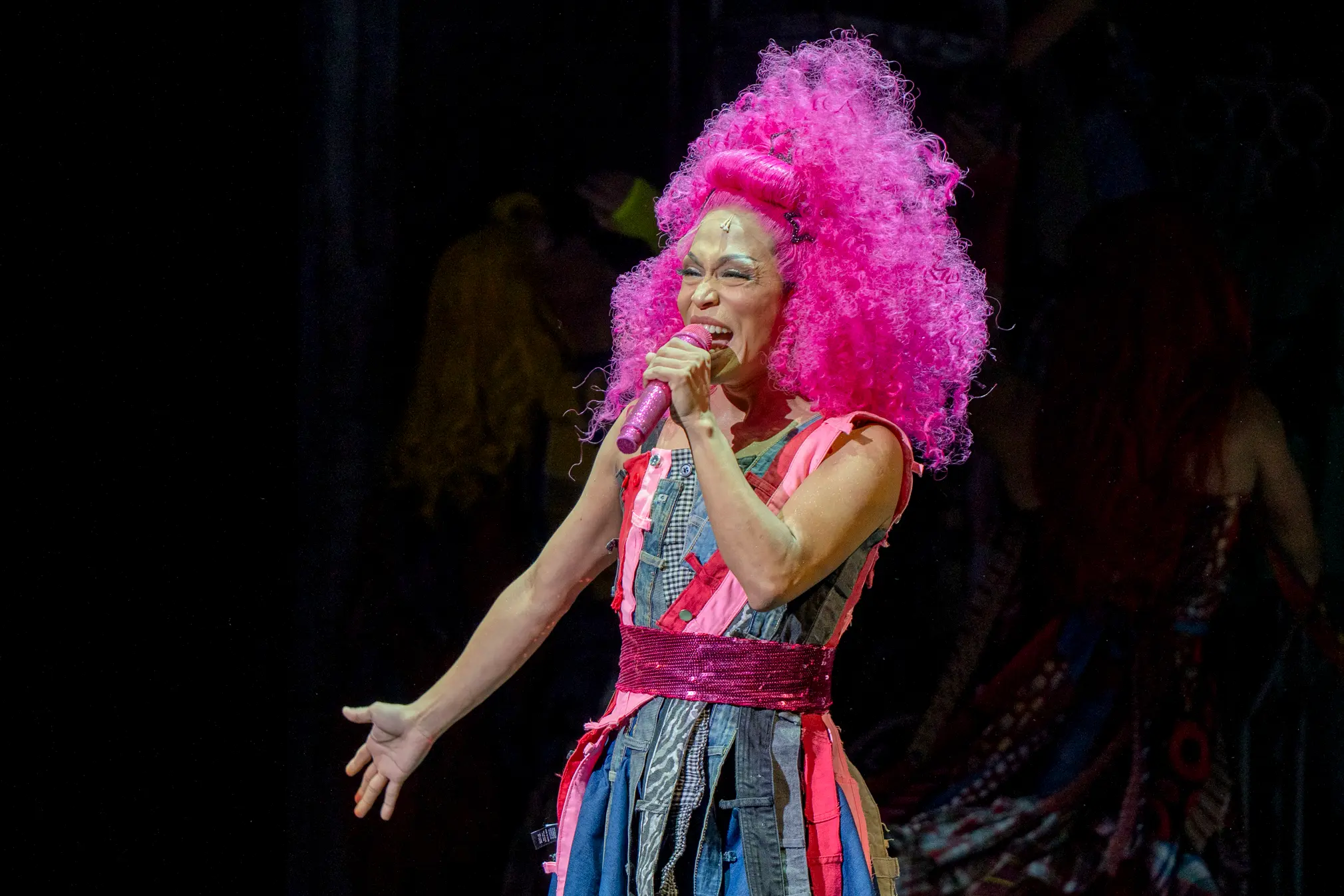 Phi Palmos as Delia D.