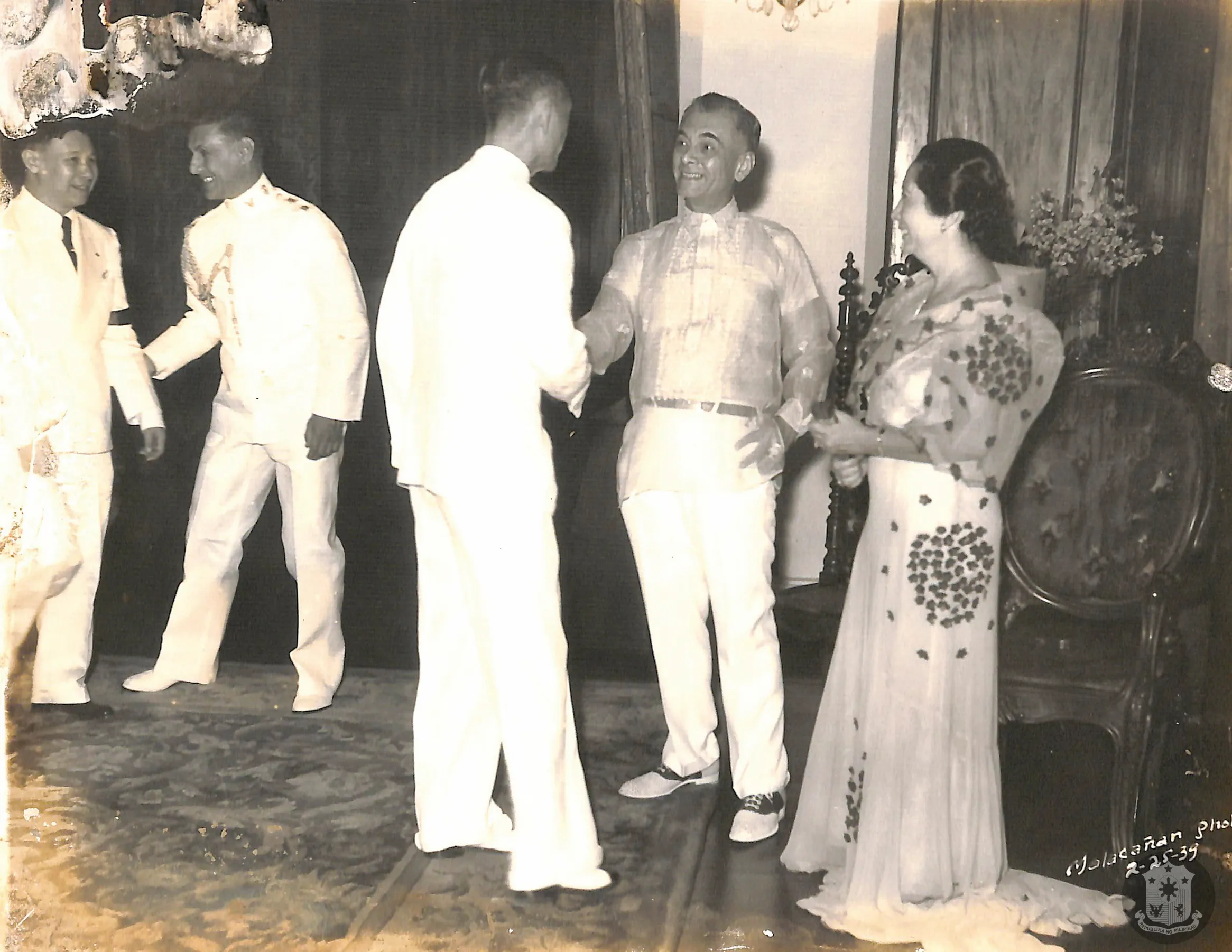 Manuel L. Quezon sporting yet another barong, accompanied by his wife, Aurora Quezon