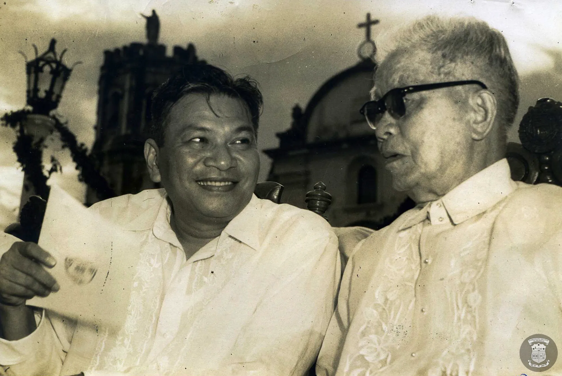 Ramon Magsaysay and an older Emilio Aguinaldo at Barasoain Church on September 15, 1956, both sporting barongs