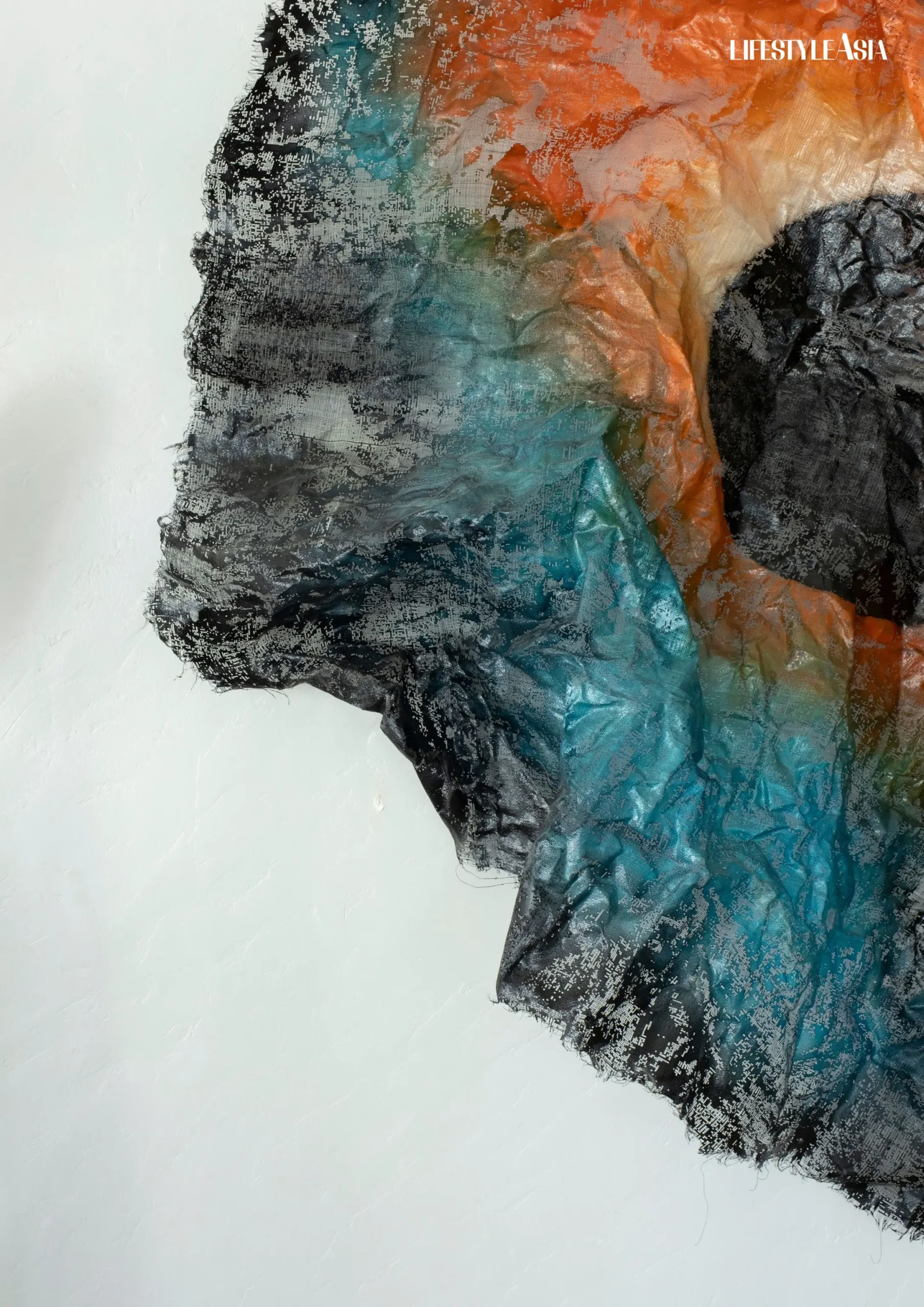 Patrick Coard’s textured sinamay mural in rich, organic colors serves as both artwork and protector