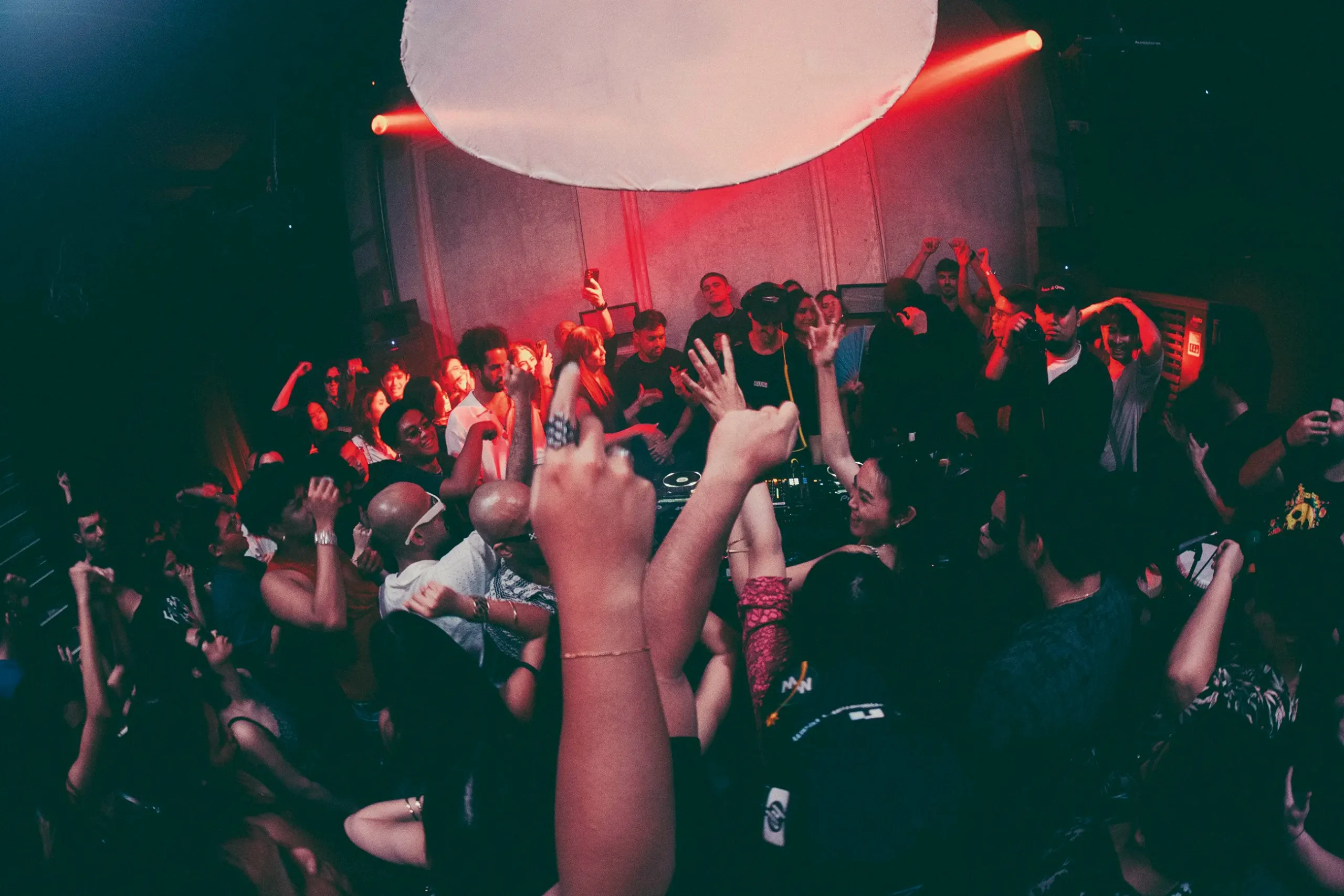 Marco Baluyot behind the DJ booth at his bars