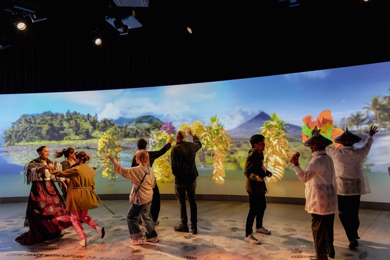 Interactive "Dancing with Nature" screen uses generative algorithms to transform human movement into living elements of the natural world on screen