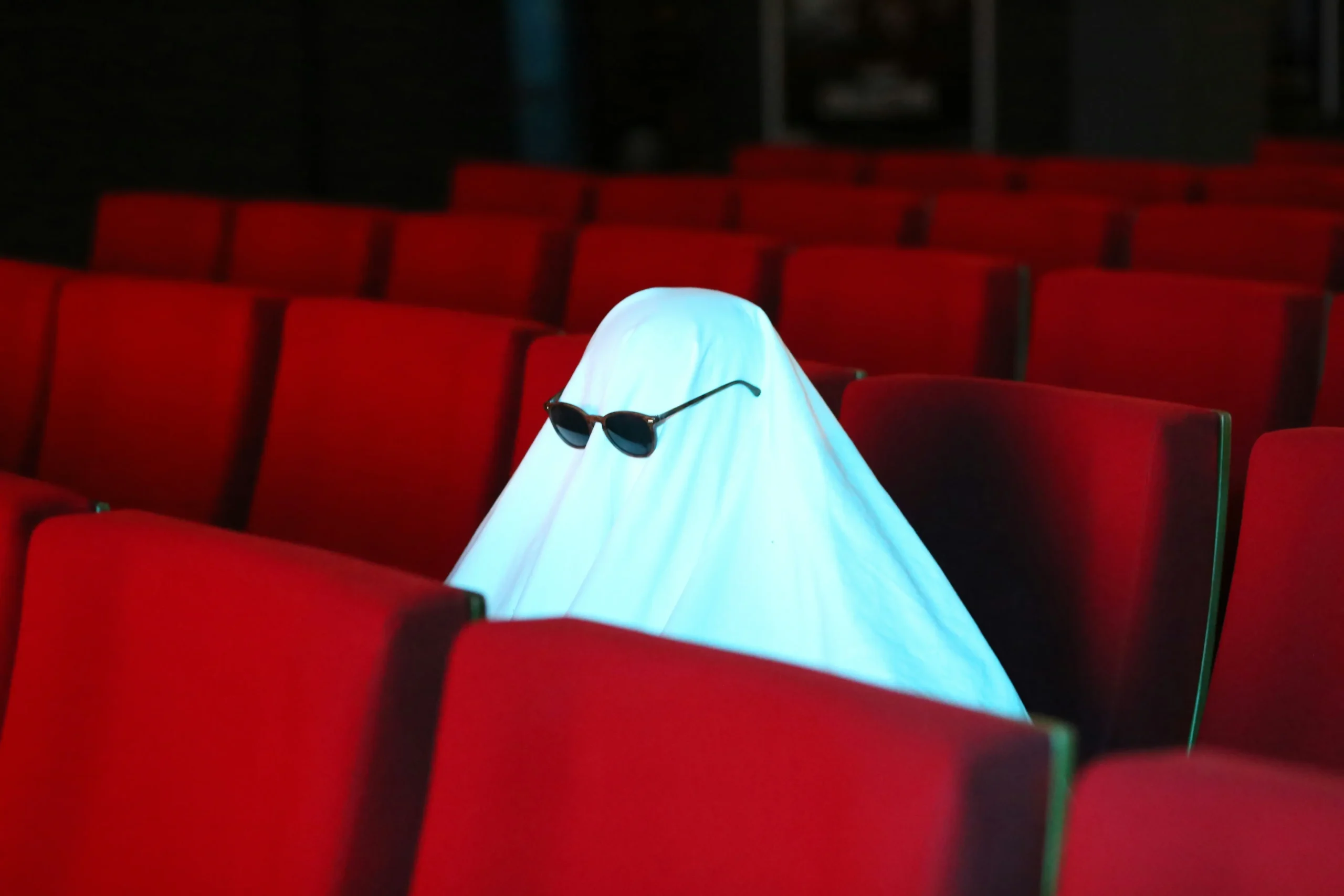 Be a ghost at your local movie theater: silent and pleasant/Photo courtesy of Billy Aboulkheir via Unplash