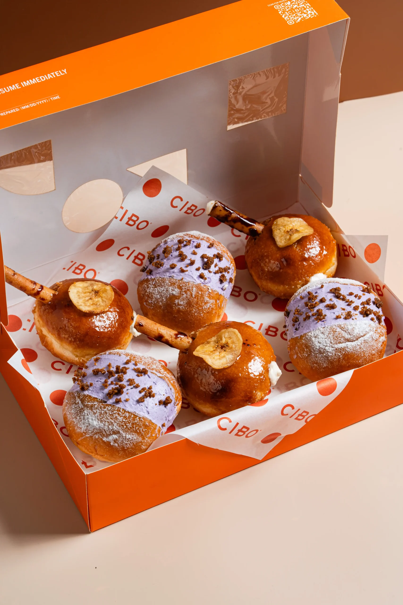 The Turon Bomboloni, assorted box of six, and Ube Maritozzo CIBO