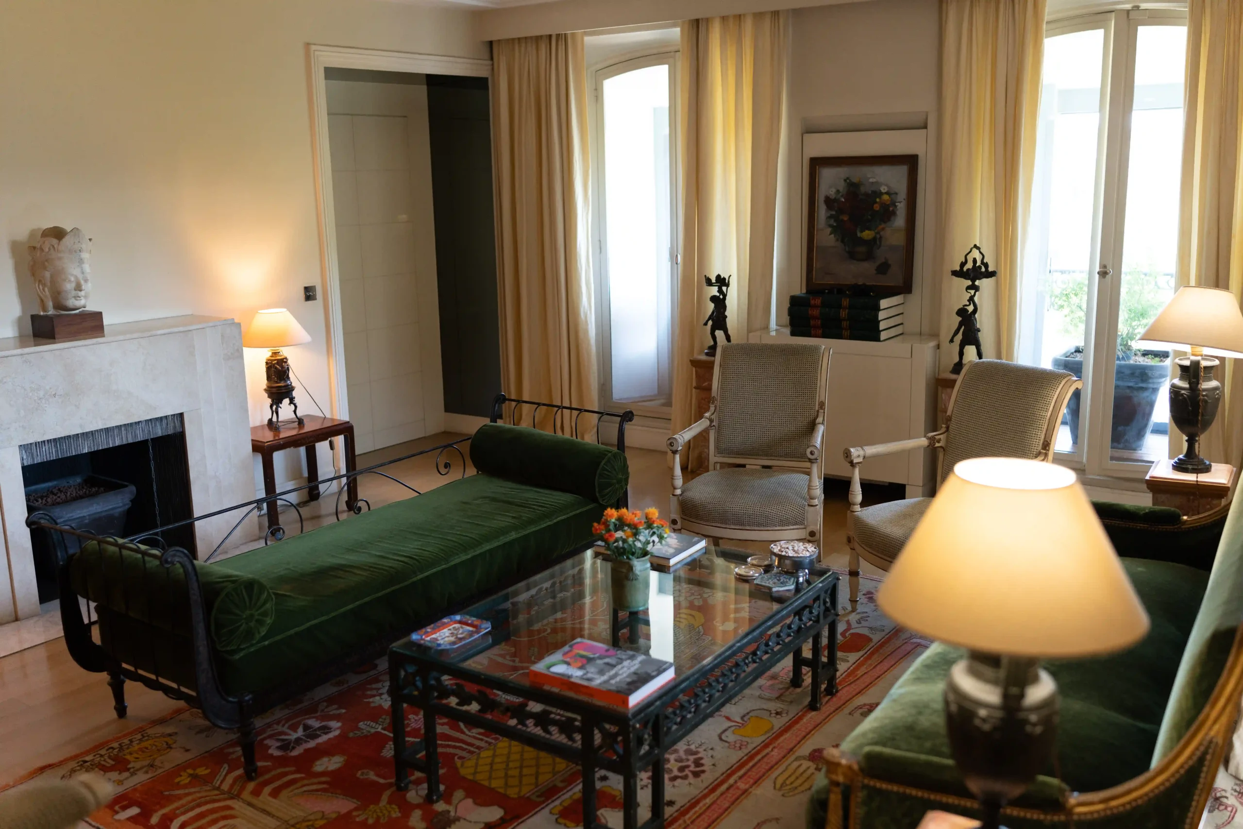 Armchairs are from the Directoire period (between the Revolution and Napoleon I), Louis XVI Gilt sofa; and metallic chairs from the same period, inspired by the first discoveries of Pompeii - Living With The Arc de Triomphe: Filipino Gallerist Jeffrey Cadayong’s Paris Apartment