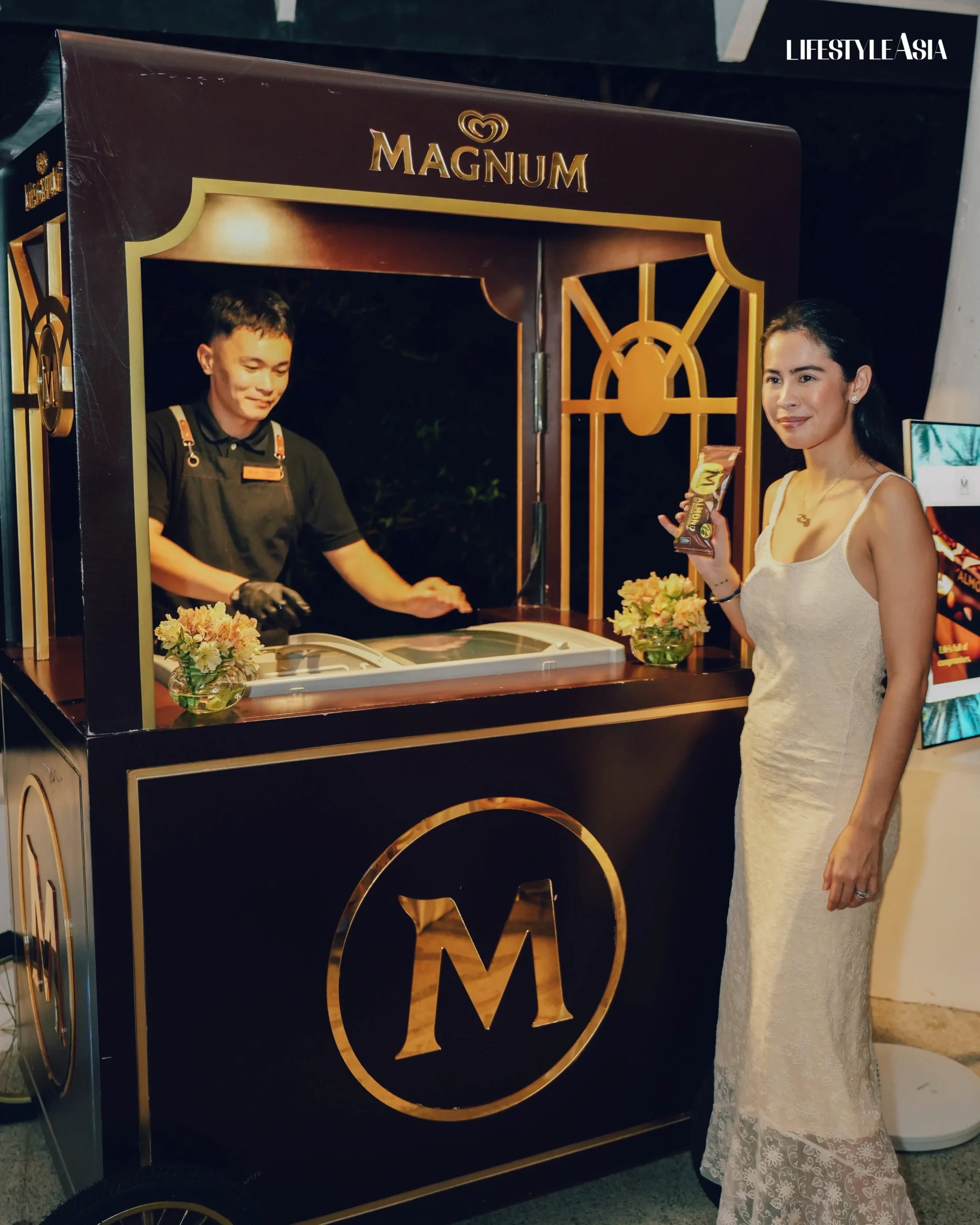 Ella Pangilinan Miranda stands by the Magnum cart, which provided guests of The Lost Weekend with constant sweet treats