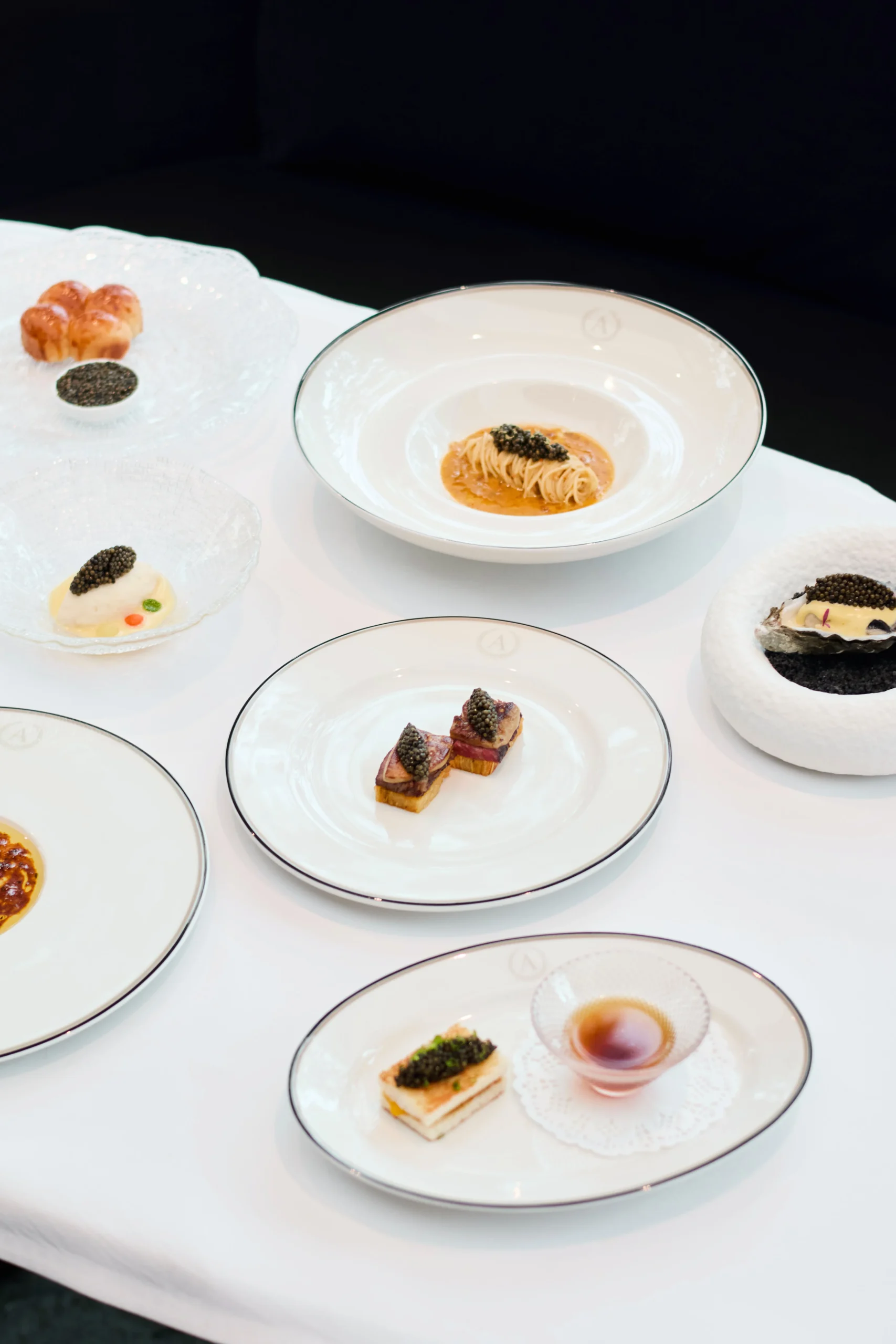 Dishes from the first Antonio's at PGA Cars x Nomad Caviar tasting menu dinner