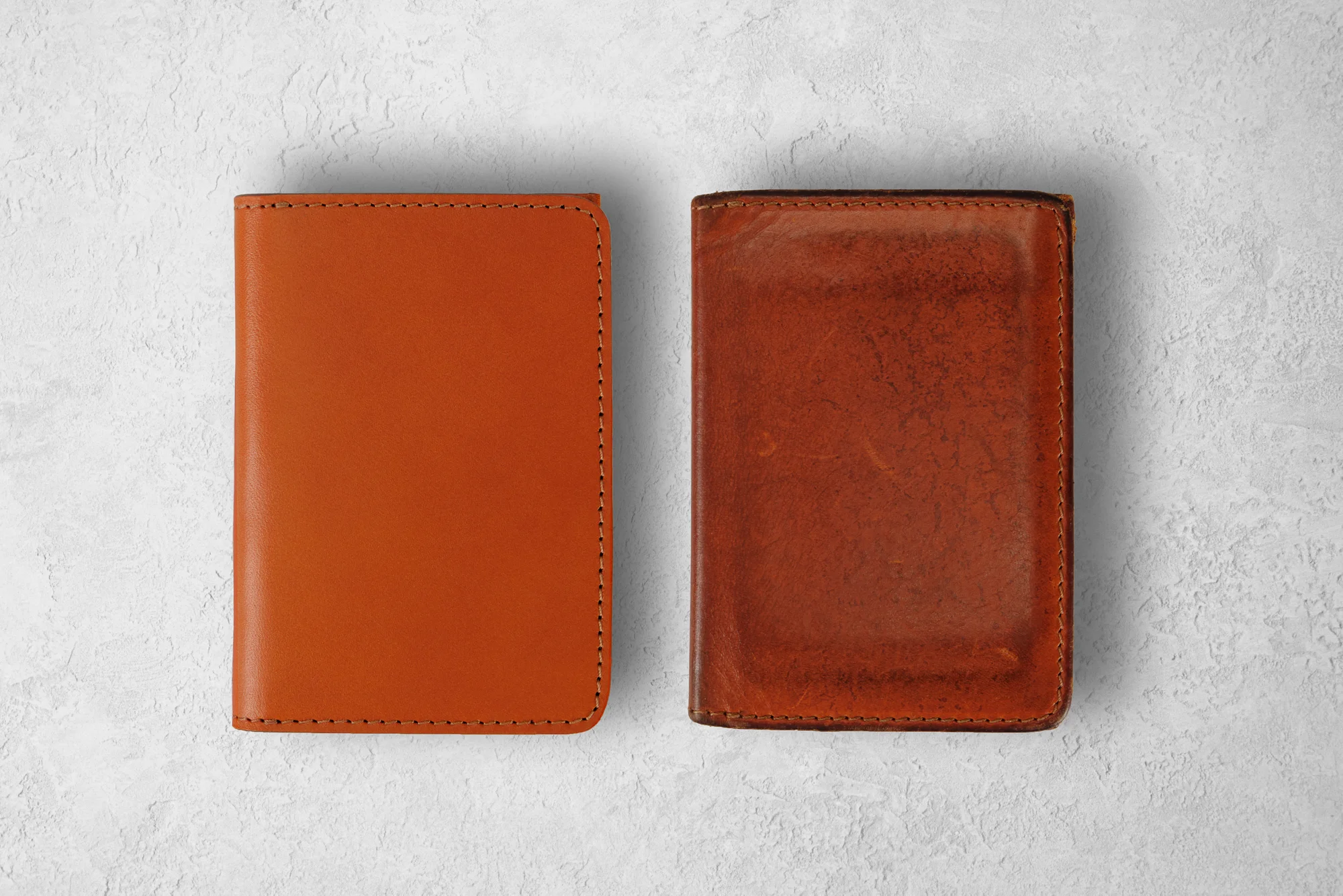 Patina is the unique darkening and subtle creasing that forms on the material as it ages
