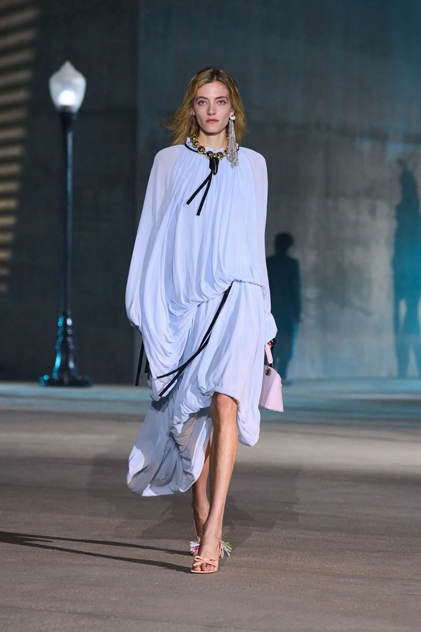 Model walking in the Dior Cruise 2027 collection runway show presented in Los Angeles