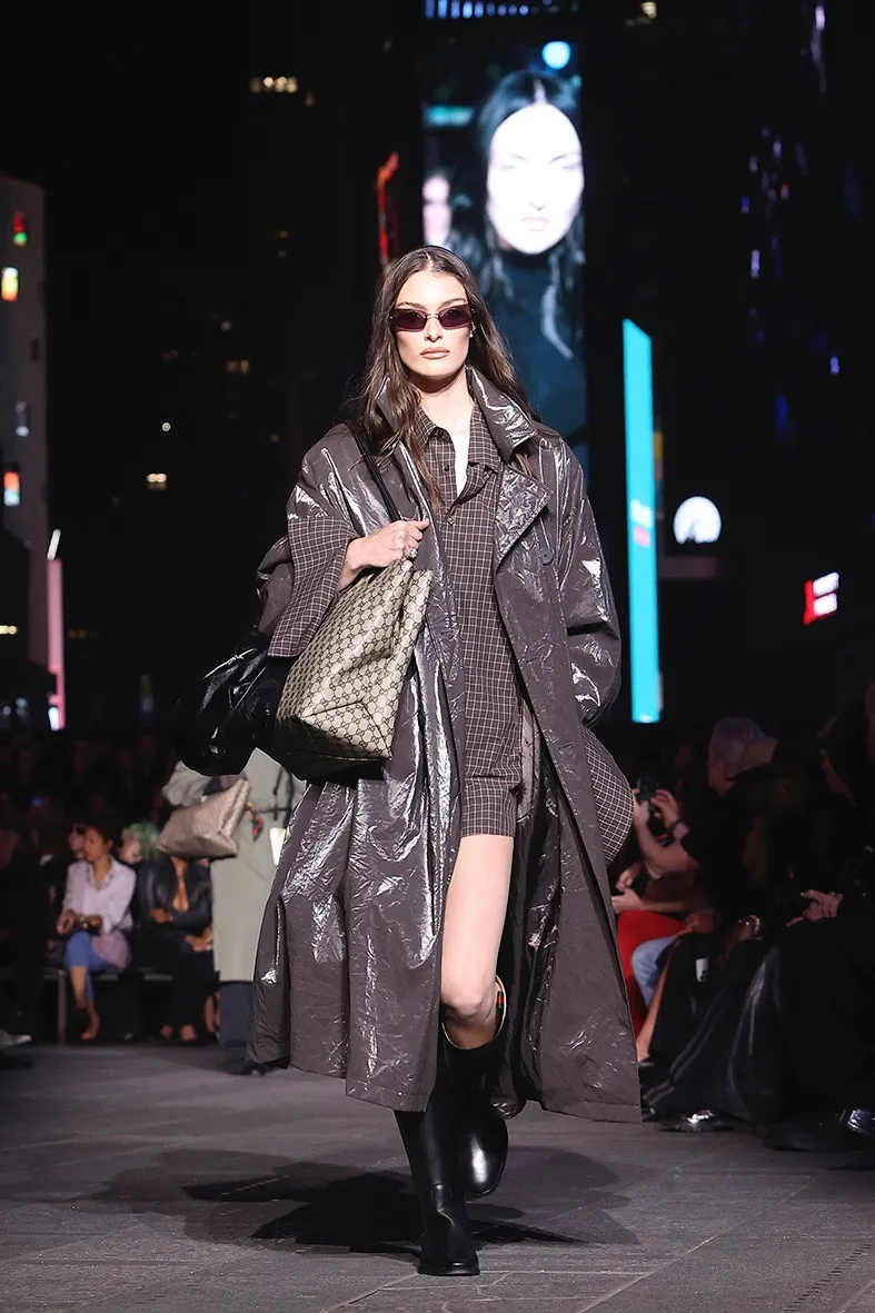 Gucci trench coat from the Cruise 2027 collection shown in Times Square