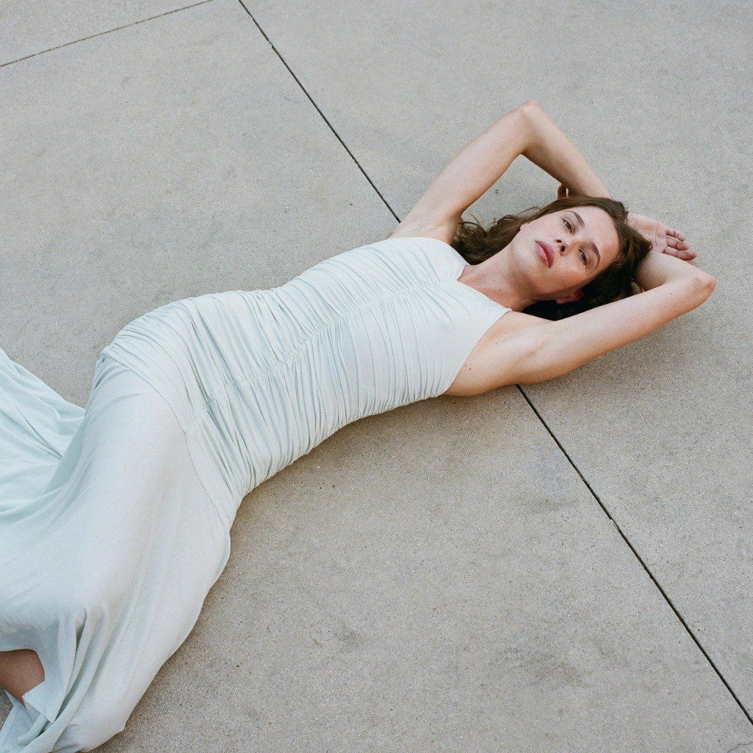 A model wears a white dress from ALC, now available in the Philippines at Rustan's