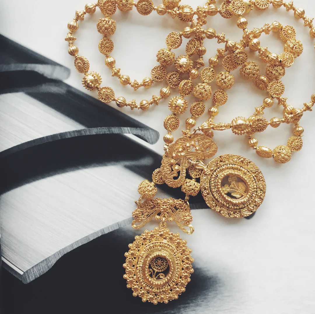 Amami Tambourine Necklace with Relikaryo Pendant How To Include “Something Old” In Your Wedding