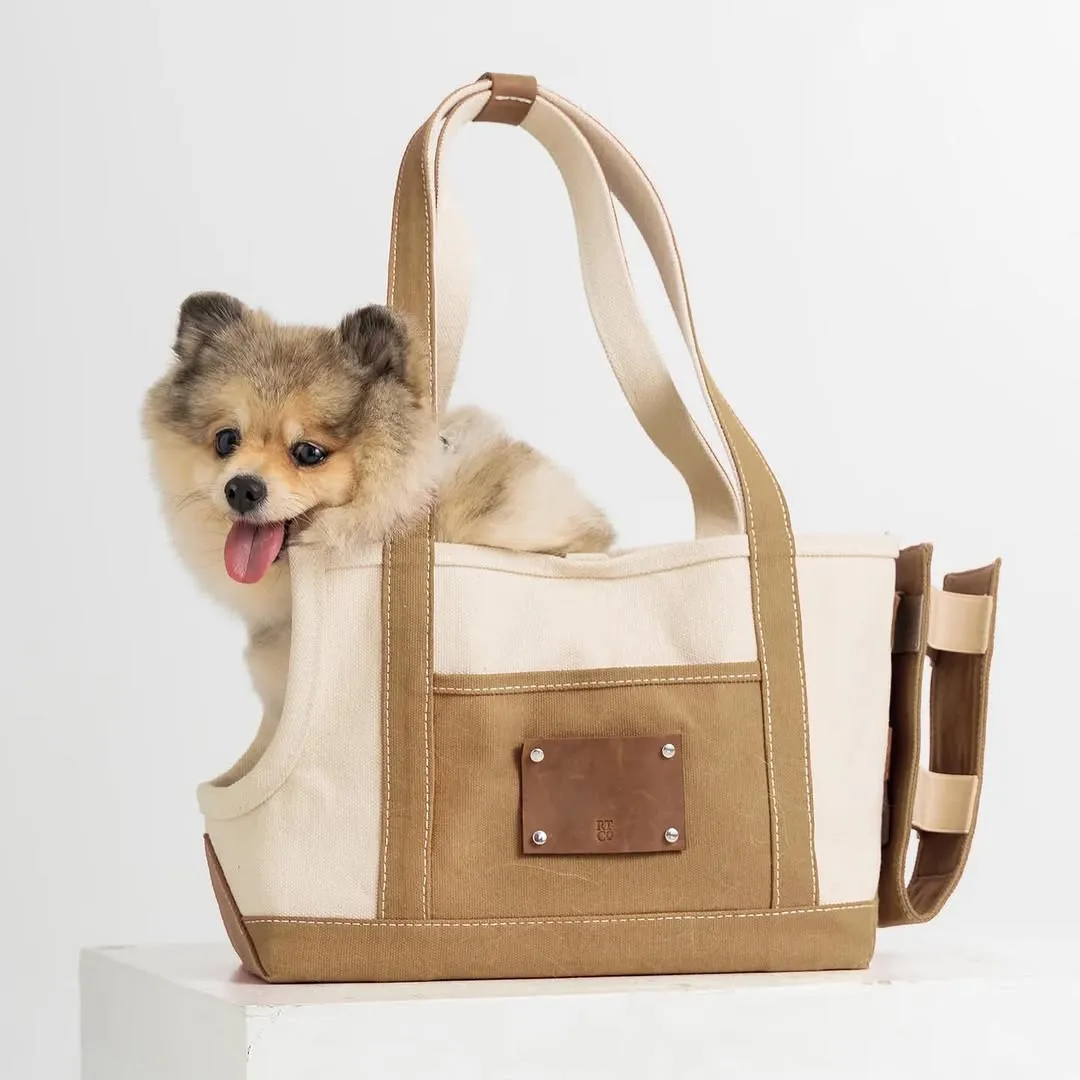 A dog in a Ruff Trading Co carrier