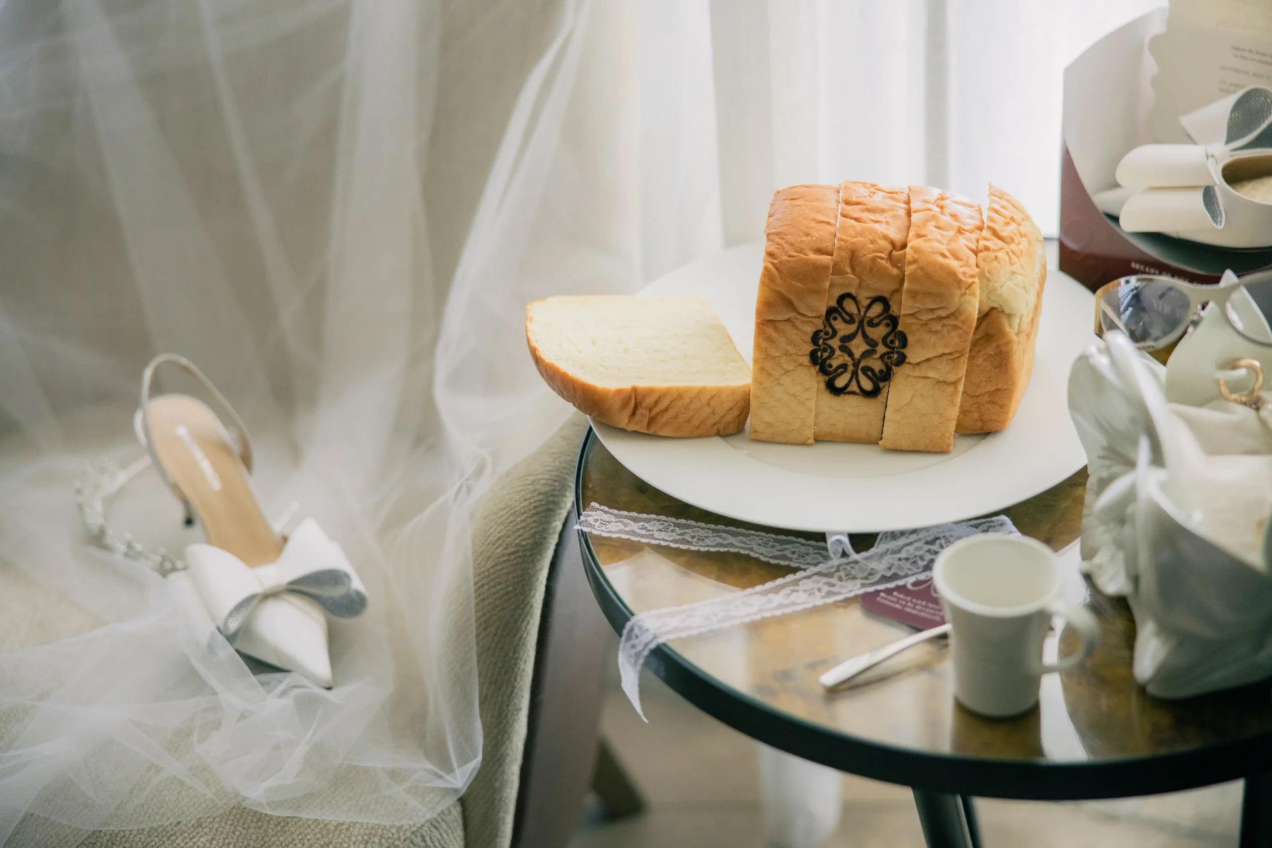 A closer look at the creative bread loaf wedding invite for Miguel Sotto And Jazmin Reyes' wedding, made with the help of the Bridal Brand Bible team and Daniel Bakery