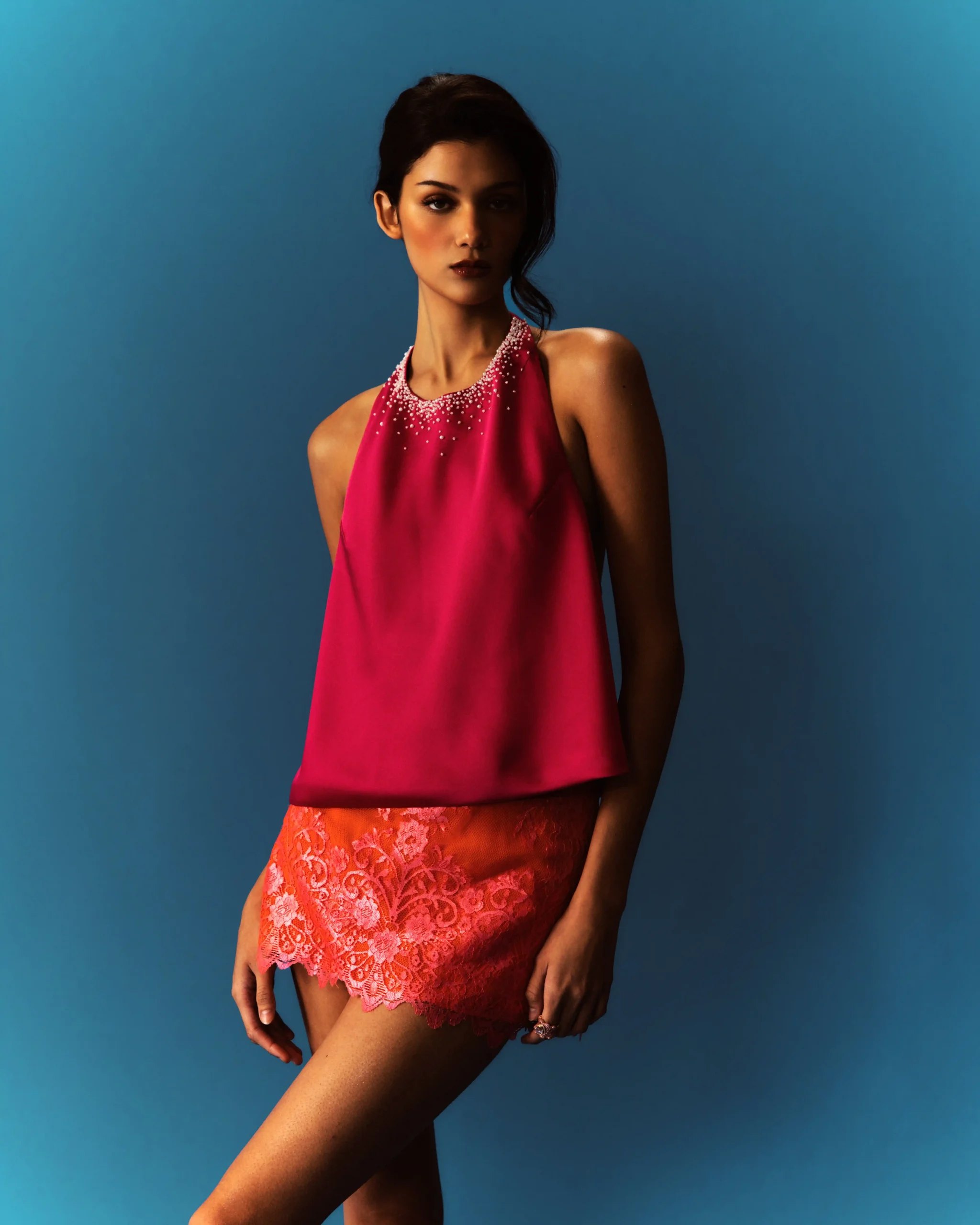 Pink top and orange lace skirt by Atelier Carlene