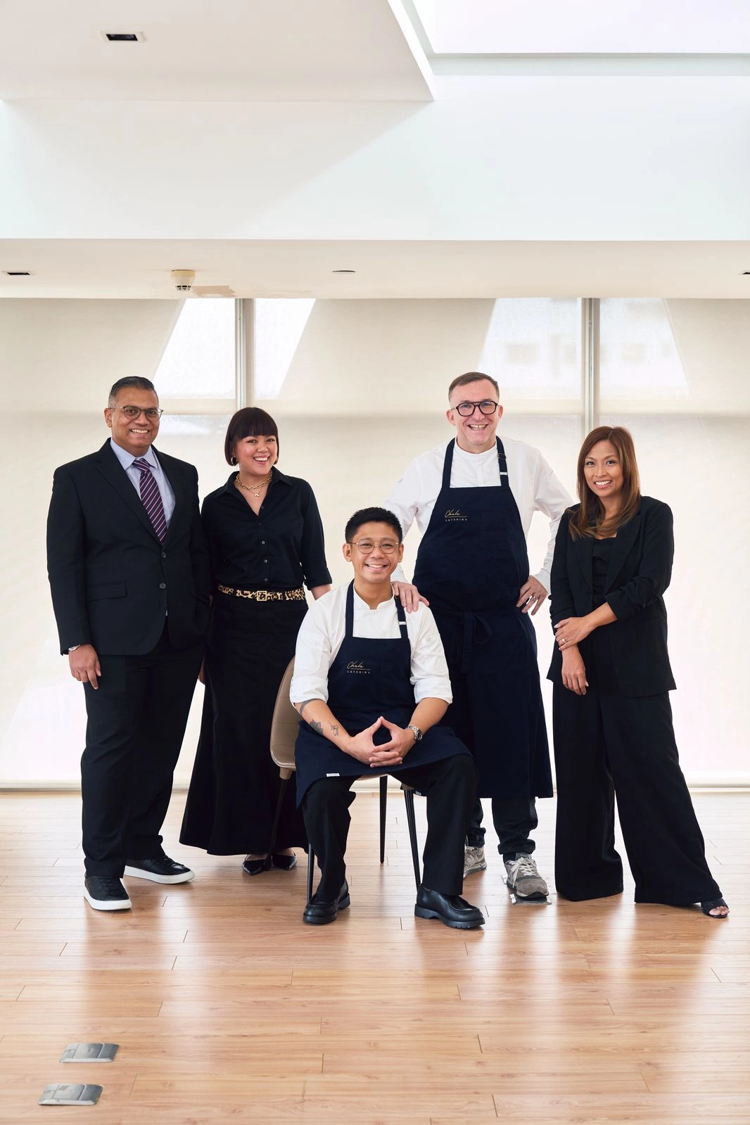 The Chele Catering team, from left to right: Cyril Addison, Mela Sison - Laxamana, Chef Carlos Villaflor, Chef Chele Gonzalez, and Teri Gonzalez