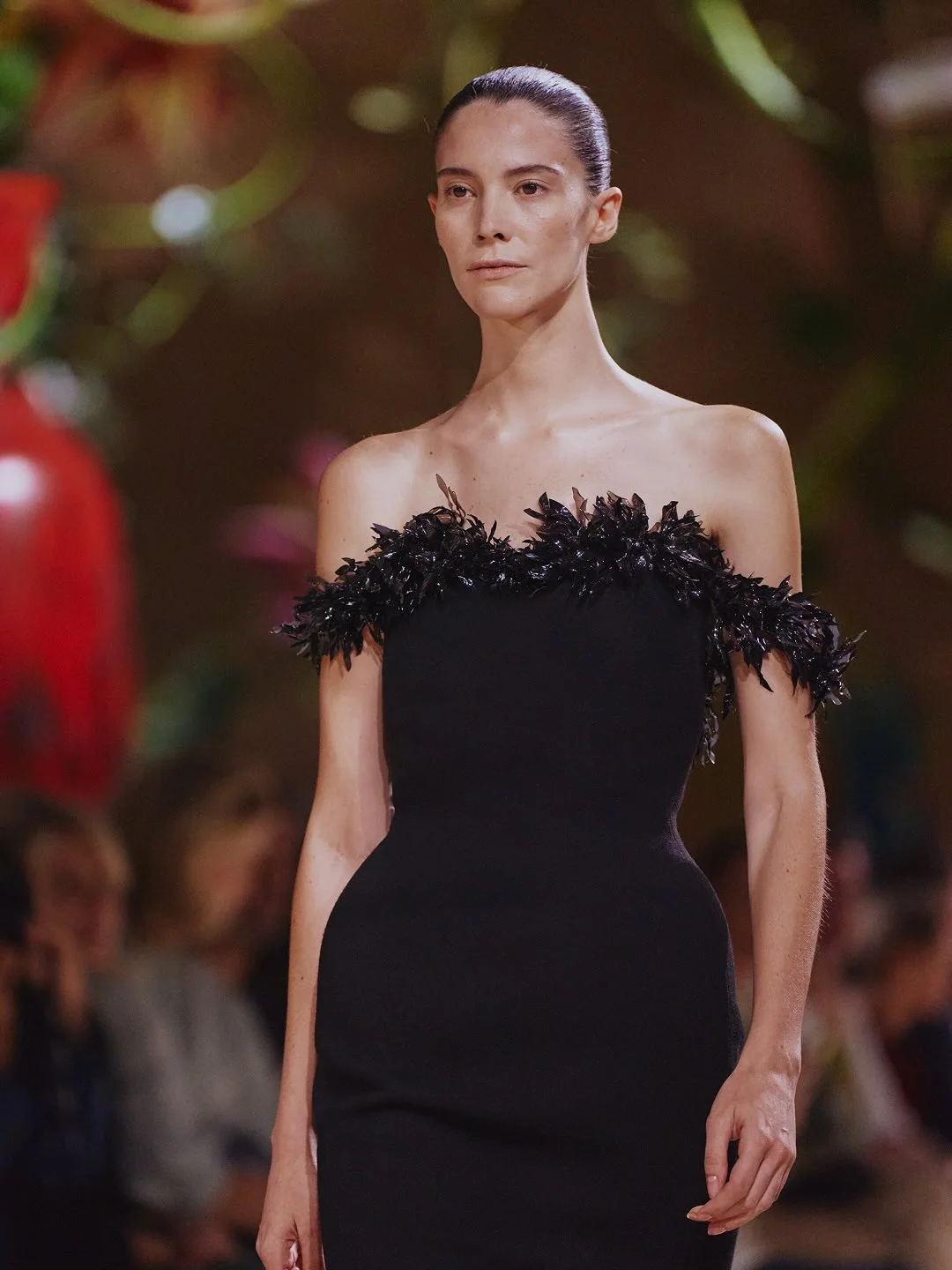An off-the-shoulder look from Chanel's Paris Haute Couture Week Fall/Winter 2026-27 runway show