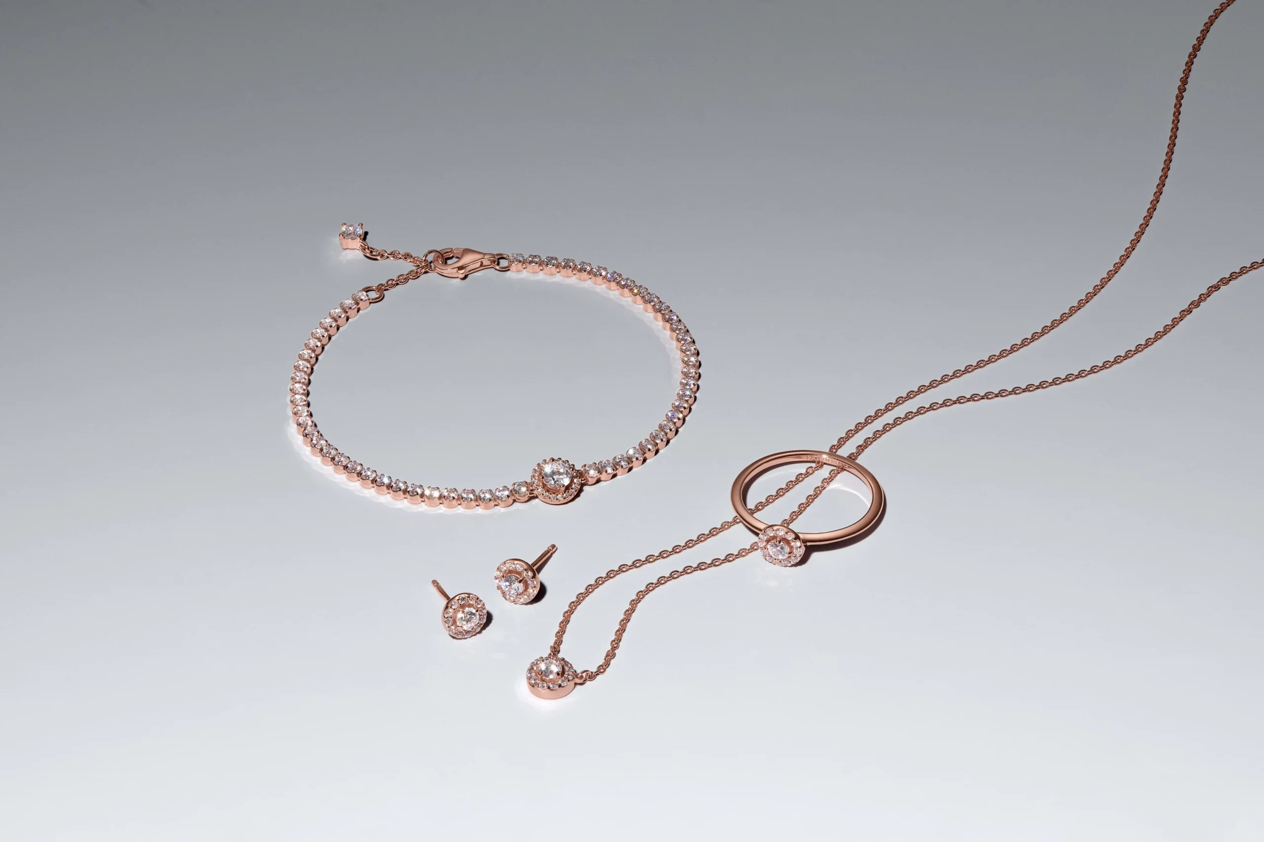 Pandora Sparkling Halo Tennis Bracelet, Round Pavé Halo Ring, Pendant Necklace, and Stud Earrings