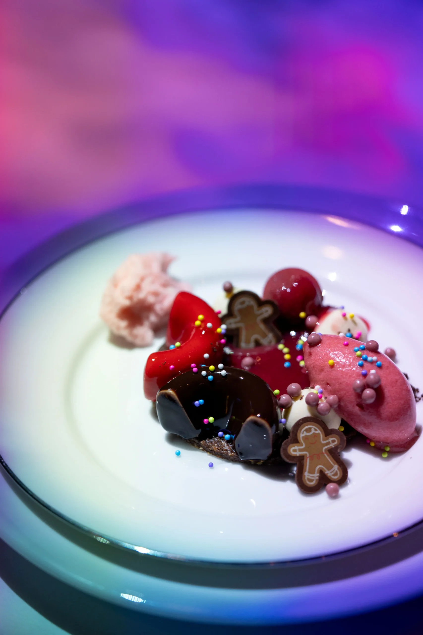 Candyland: vanilla mousse, brown butter financier, raspberry sorbet, gingerbread man, and chocolate soil