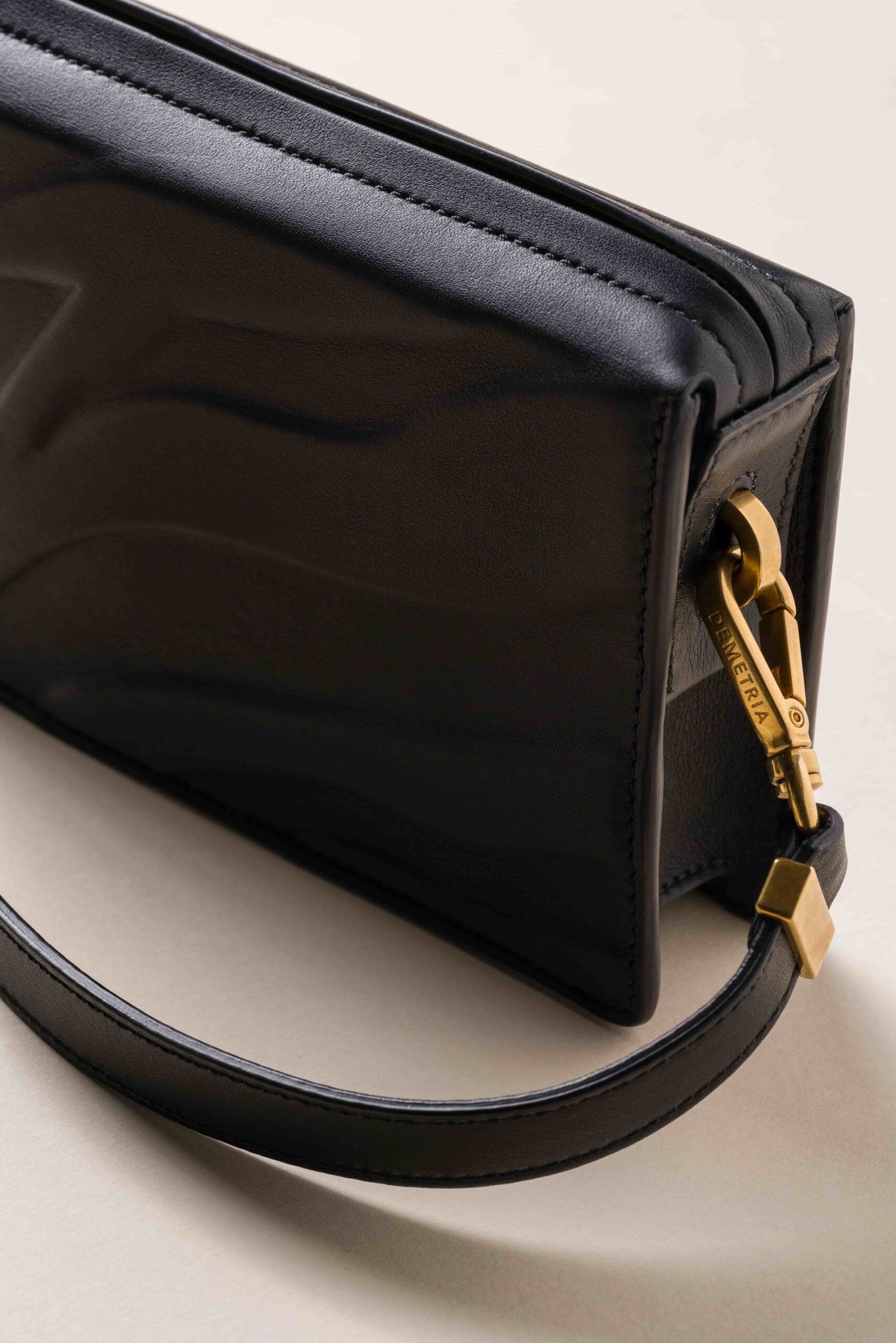 Demetria bags Monette clutch detail