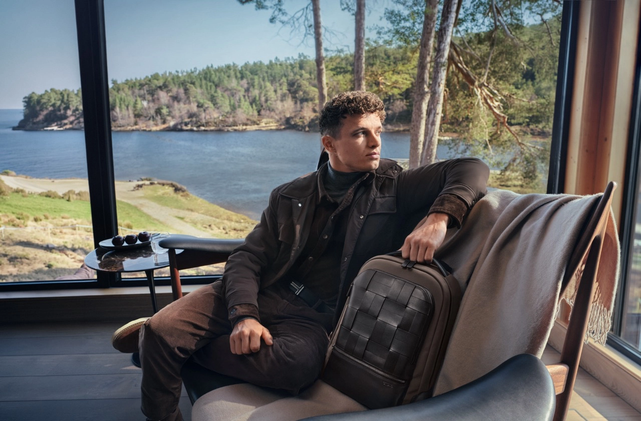 Lando Norris with the TUMI Harrison Bradner Backpack in Taupe Black Woven
