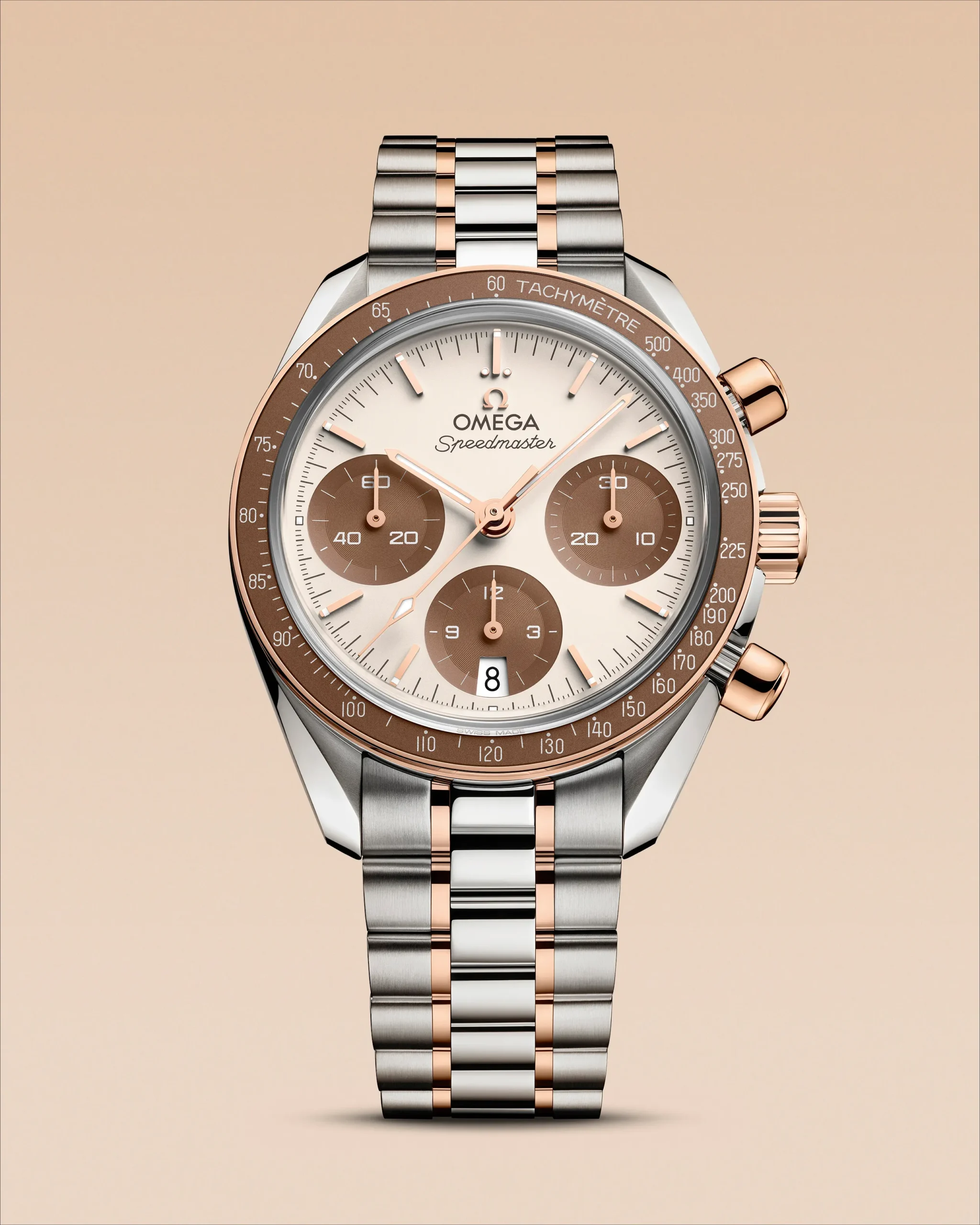 The OMEGA Speedmaster 35 mm with brown subdials, an 18-karat Sedna Gold bezel and a brown aluminium ring