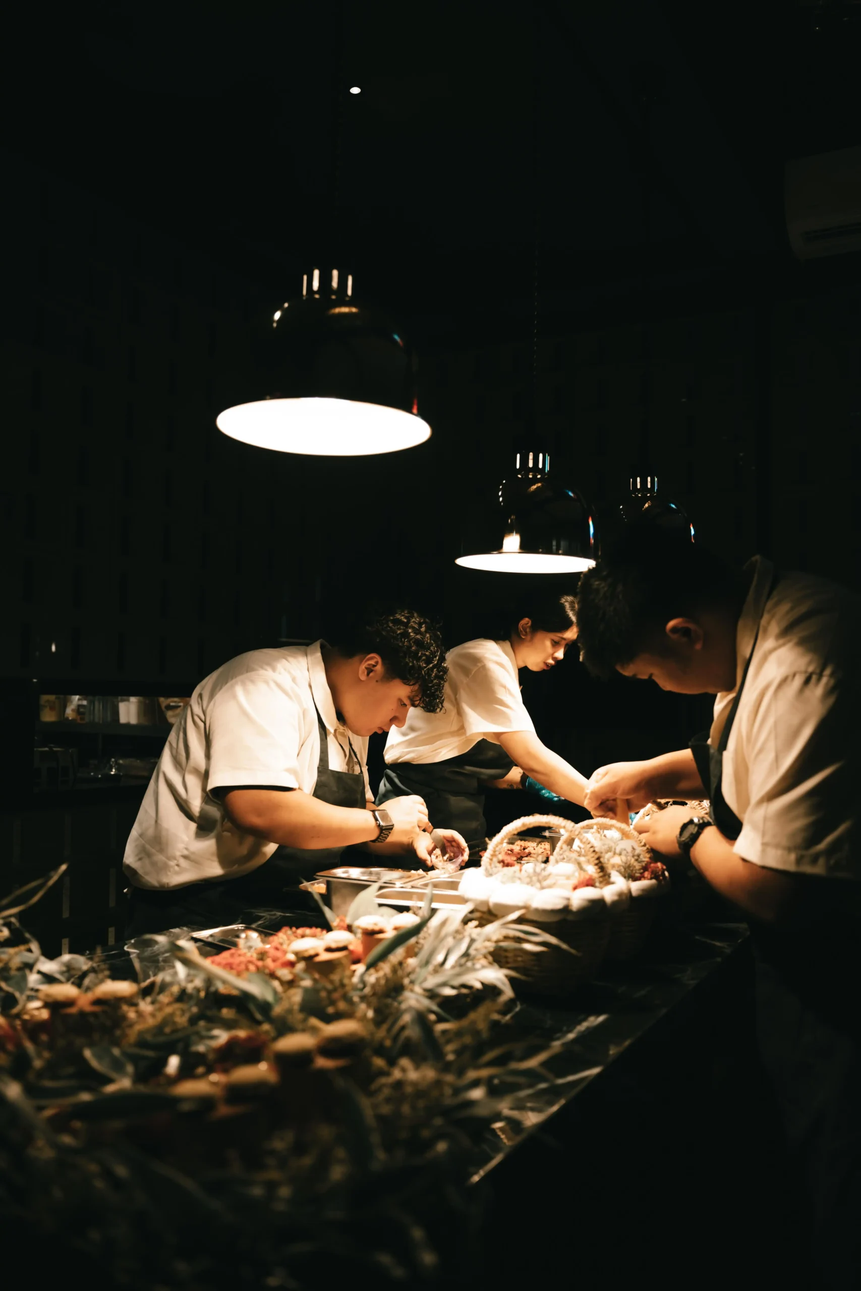 Chefs at work at Tadhana; Binatog (corn tortilla with truffle comte espuna, and coconut snow); and Pakwan (a crispy rice cake with watermelon and miso honey) from Tadhana; Tinapay (laminated tinigib cornbread with tinapa mousse and dalandan sherry marmalade) from Tadhana; Sinigang sa Bayabas (maya maya with batuan, kangkong, and whipped gabi) from Tadhana