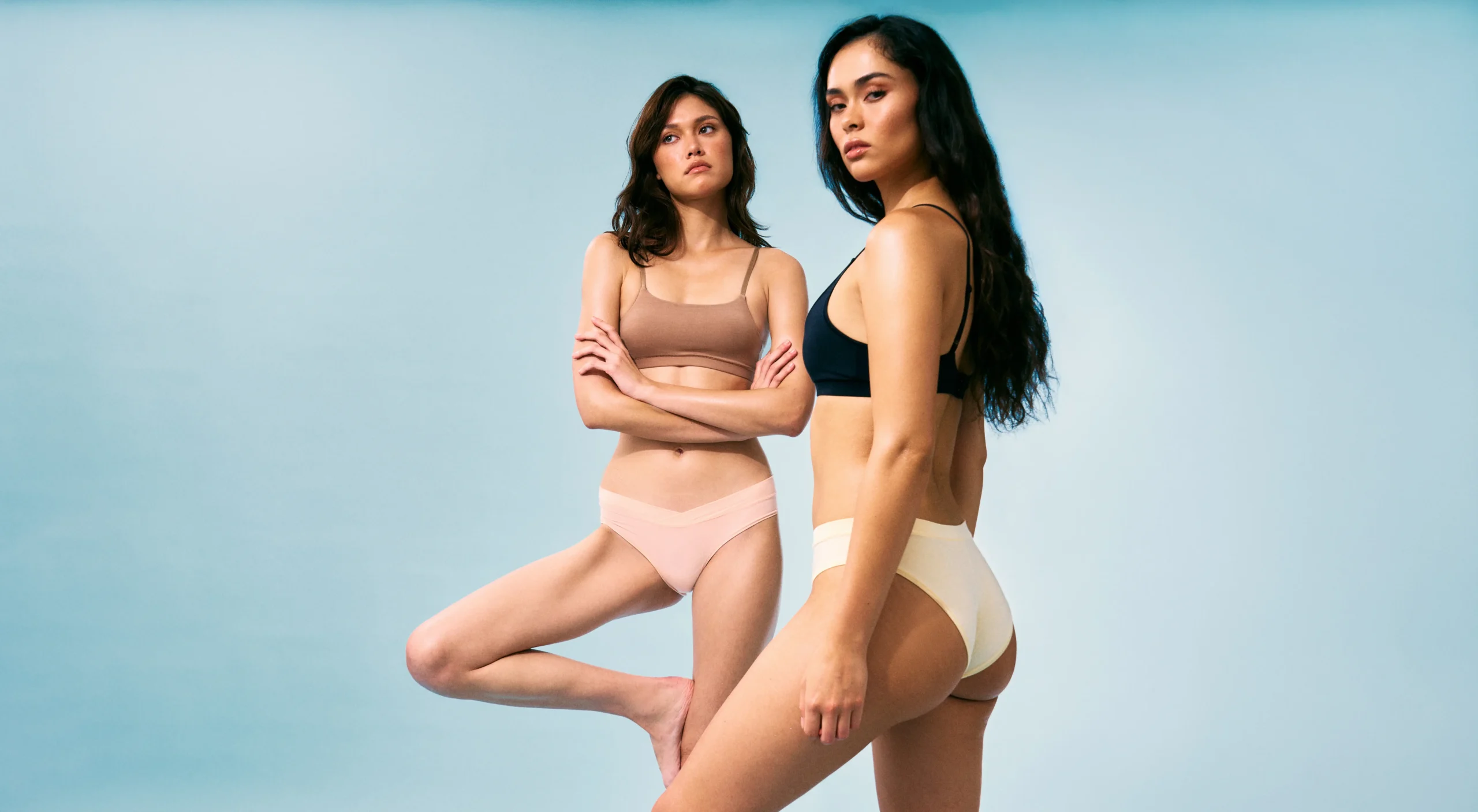 Nora Go-To bralettes in Charcoal and Toasted, paired with the new Peach and Butter underwear shades