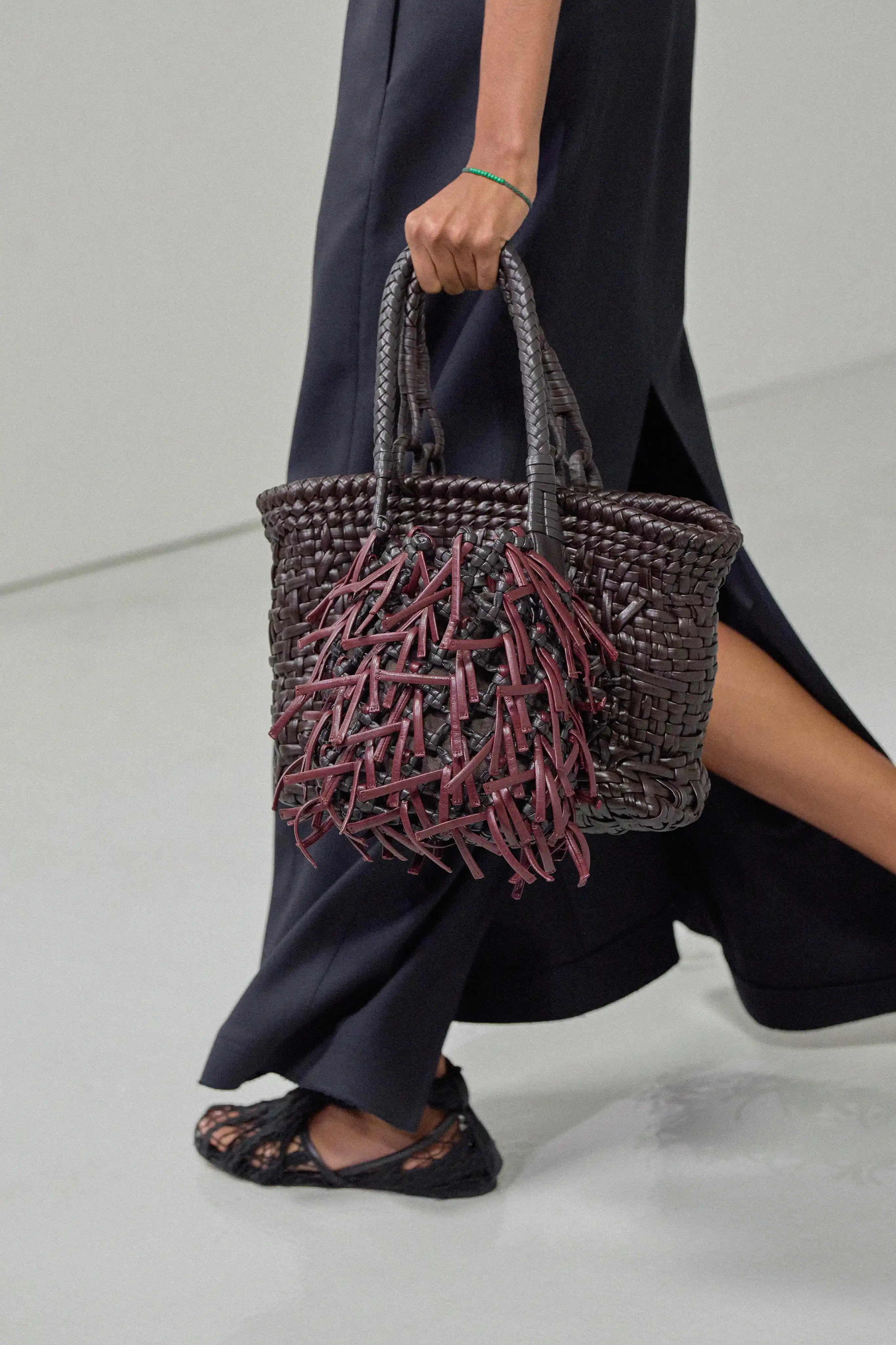 A distinct muted maroon featured in the Bottega Veneta Spring/Summer 2027 collection